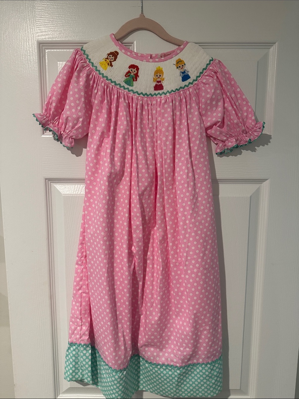 Pink Polka Dot Girls' Dress with Smocked Princess Motif